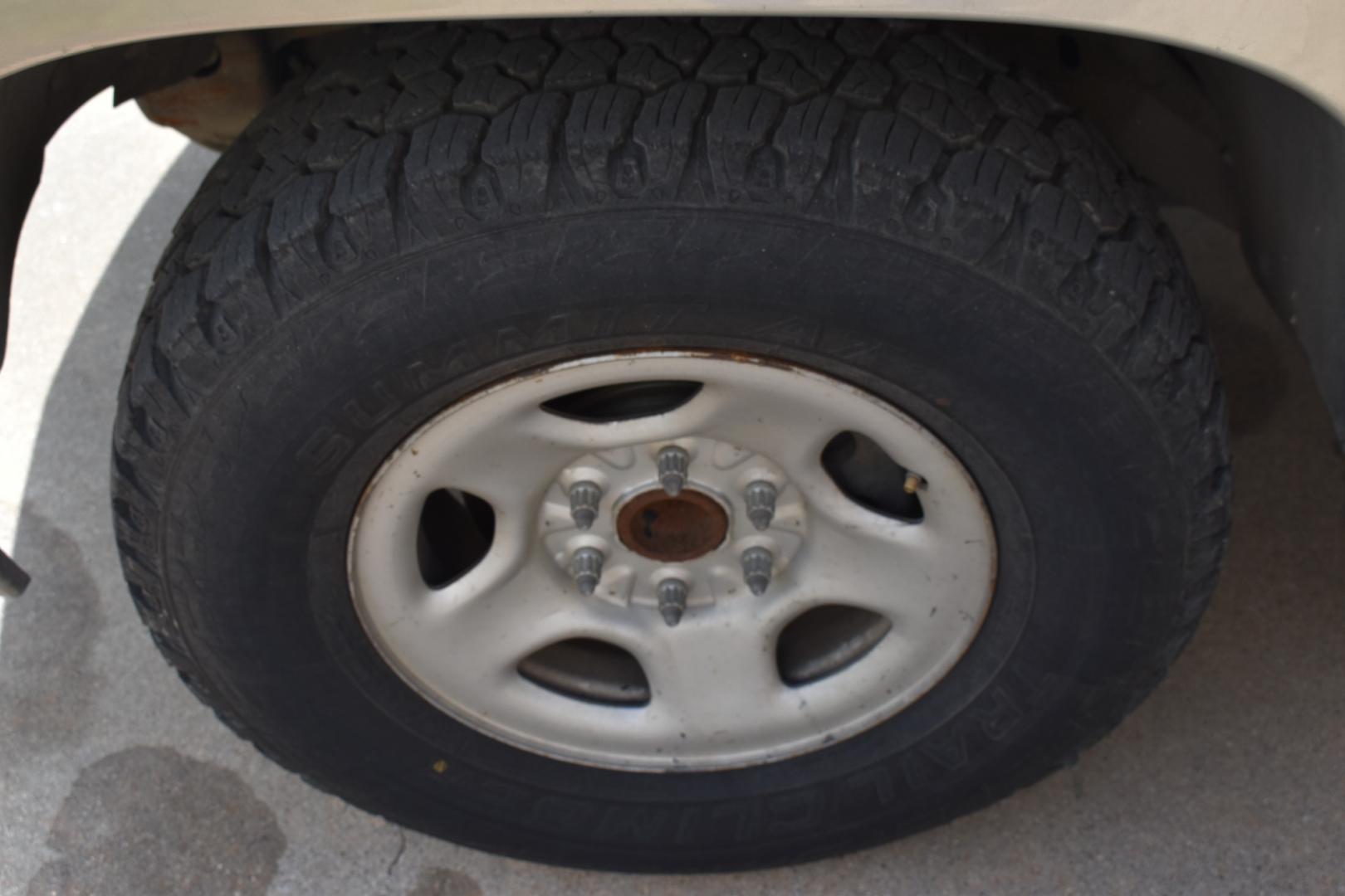 2003 Gold /Tan Chevrolet Suburban (1GNEC16Z23J) with an V8, 5.3.0L engine, 4 SPEED AUTOMATIC transmission, located at 5925 E. BELKNAP ST., HALTOM CITY, TX, 76117, (817) 834-4222, 32.803799, -97.259003 - Buying a 2003 Chevrolet Suburban can offer several benefits, including: Spaciousness: The Suburban is known for its ample interior space, making it great for large families, hauling cargo, or even converting into a camper. Towing Capacity: It's equipped with a robust engine and frame, allowing it - Photo#23